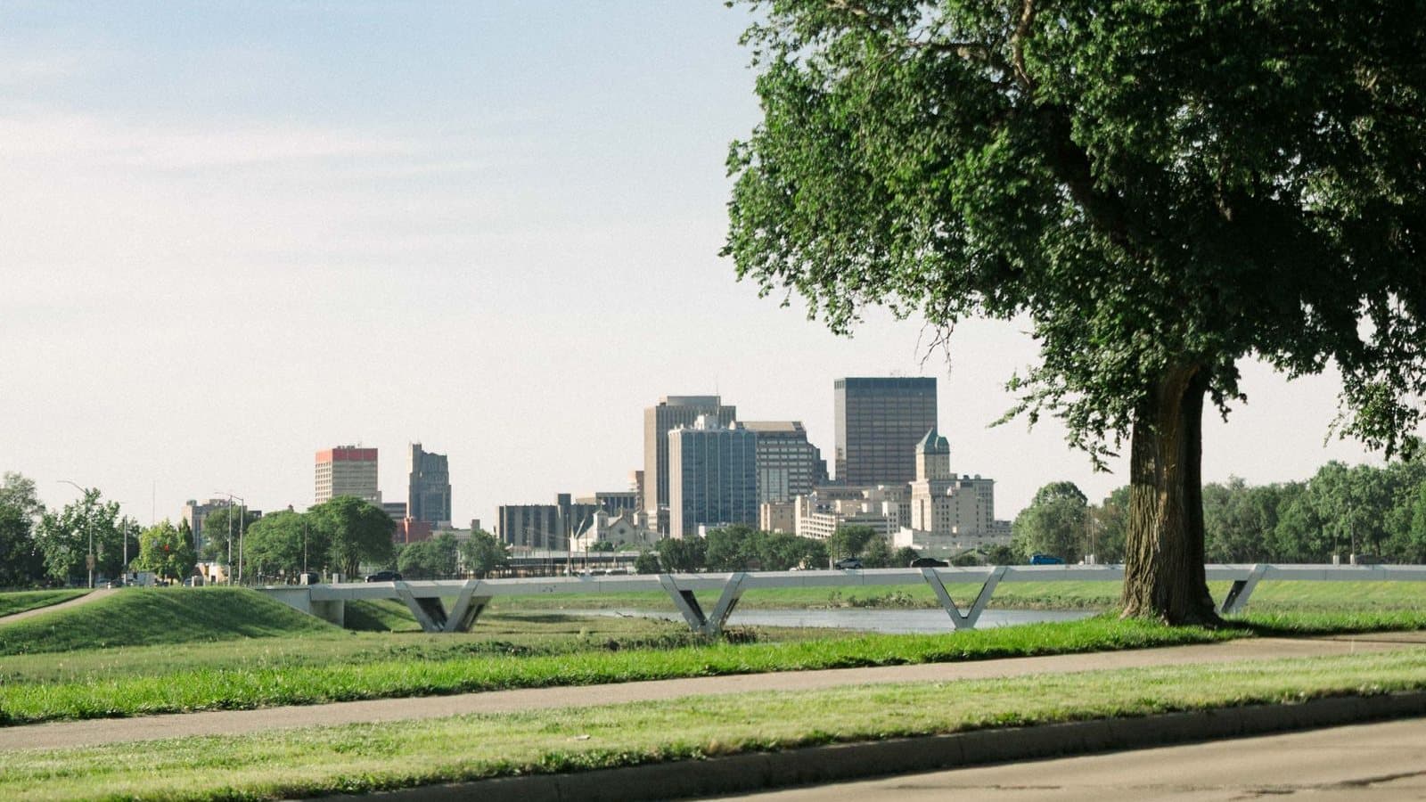 The downtown Dayton skyline seen across the Great Miami River on a summer morning